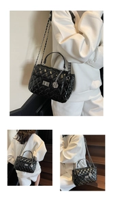 Detailed close-up of a black quilted crossbody bag with silver chain and metal lock
