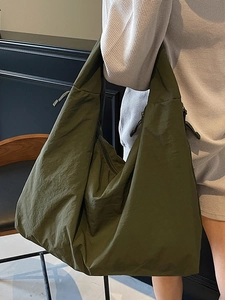 Olive green large capacity tote bag in crinkled nylon fabric for casual urban style