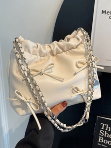 Chic cream white pleated bow tote bag with woven metal chain strap for women