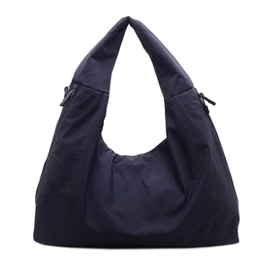 Deep blue nylon hobo shoulder bag with wrinkled texture and double zipper design