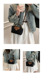 Mini nylon dumpling bag with leather handle and strap shown on model for size and fit