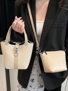 Minimalist beige woven bucket handbag and matching leather crossbody bag set for women