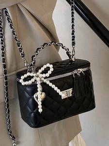 Quilted black leather box handbag with pearl bow pendant and silver chain strap for women