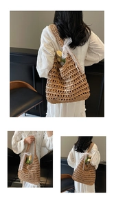 Detail of hollow woven straw tote bag featuring white lace bow and floral accent