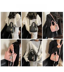 Detail shots of minimalist lychee pattern bucket bag with cute cartoon pendant in 6 views