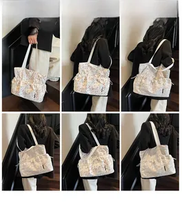 Detailed views of floral canvas tote bag showing multiple pockets and drawstring closure