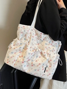 Floral print tote bag with ruffled lace fabric and drawstring design for sweet casual style