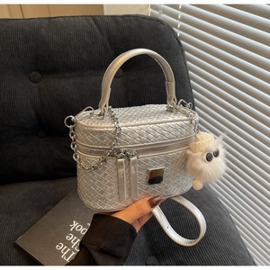Silver woven texture mini box bag with chain strap and cute white plush charm detail