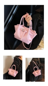 Detailansichten einer rosa Eimer-Tasche aus Leder mit Handgriff und Umhängeoptionen