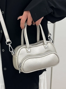 Silver lychee textured leather bowling bag with detachable shoulder strap for women