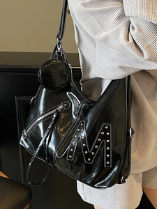 Glossy black moto-style tote bag with rivet M design and detachable round coin purse