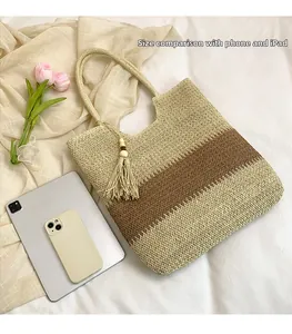 Detail of woven tote bag showing large capacity for iPad and mobile phone storage