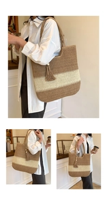 Detail of handwoven straw tote with brown stripes and decorative wooden bead tassel