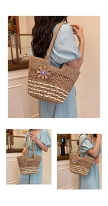 Detailed close-up of handmade straw tote bag featuring purple flower and woven texture