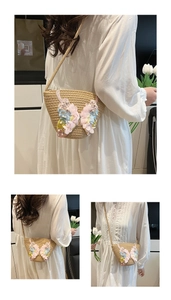 Detail der handgewebten Stroh-Beuteltasche mit 3D-Chiffon-Schmetterling und Perlenverzierung
