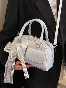 Light blue patent leather Boston bag with pearl lace bow charm and shoulder strap