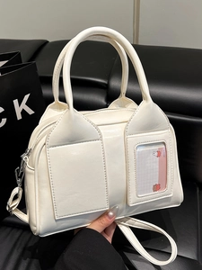 Minimalist white leather Boston bag with double pockets and adjustable shoulder strap