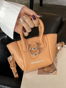 Mini borsa per rossetto arancione trama litchi con anelli argento e tracolla regolabile