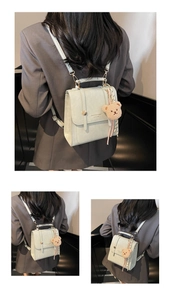 Detail view of mini green backpack with leather texture and bear plush charm accessory