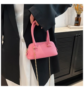 Pink lychee grain leather mini shell bag with gold bead chain strap and top handle