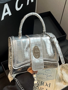 Chic silver crocodile embossed leather handbag with chain strap and metallic finish