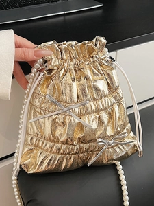 Women Shiny PU Leather Bucket Bag Chic Metallic Pleated Drawstring Shoulder Bag With Artificial Pearl Strap Bow Detail Trendy Crossbody Handbag