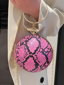 Pink snakeskin spherical clutch bag with a diamond-encrusted gold ring handle and chain strap