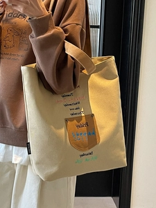 Canvas tote bag with embroidered letters and large capacity for school and casual wear