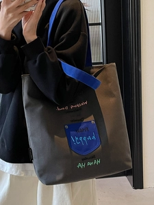 Canvas tote bag with embroidered letters and high capacity for casual daily use
