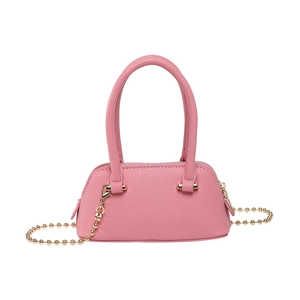 Pink shell shaped crossbody bag with lychee texture, golden chain, and top handles