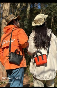 Umhängetasche aus DuPont-Papier in Schwarz und Orange für Outdoor und Freizeit-Sport