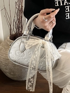 Silver Y2K Boston handbag with embossed graffiti heart patterns and lace ribbon decoration