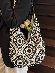 Ethnic bohemian crochet tote bag with black and white geometric floral knit patterns