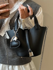 Classic black litchi pattern bucket bag with silver padlock and metal chain strap