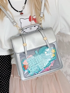 Silver glitter ita-bag with transparent window and adjustable gold buckles for badges