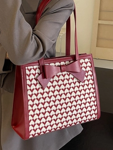 Elegant red bow heart pattern houndstooth tote bag for women shown with model styling