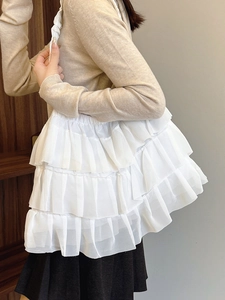 White multi-layered tiered ruffle tote bag with a pleated ballet style design