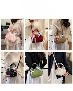 Detailed view of candy color bowling bags in pink, wine, green and white variants