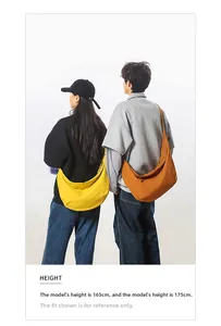 Comparison of yellow and orange nylon crescent bags on male and female models