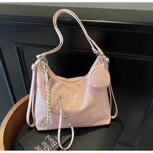 Pink patent leather tote with silver zippers, mini coin purse and striped silk scarf