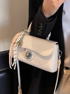 Sac à main minimaliste en cuir crème pour femmes avec détail de sangle tissée colorée