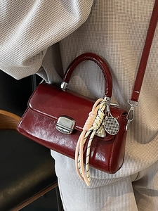 Burgundy faux leather crossbody square bag with vintage texture and sports charms