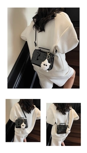 British style black oil wax leather satchel bag with cute white plush monster pendant