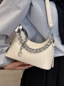 Minimalist creamy white oil wax leather underarm bag with silver chain and metal pendant
