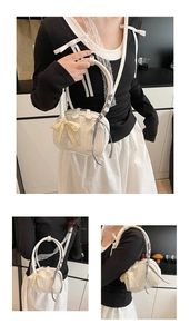 Cream mini bowling bag with lace bow and plaid ribbon shown from various carrying angles