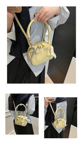 Detail of yellow bowling bag with lace and checkered bows and textured leather finish