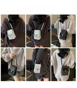 Detailed views of a minimalist mini crossbody phone bag with adjustable strap and buckle