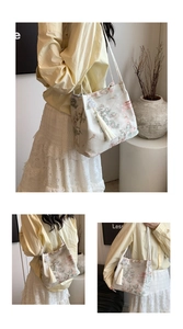 Détail du sac cabas nouveau style chinois avec imprimés d'oiseaux en soie et glands blancs