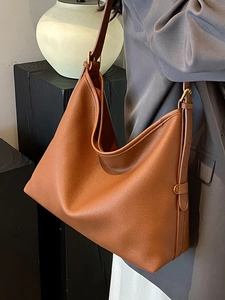 Brown lychee leather Hobo tote bag with adjustable strap and minimalist vintage style