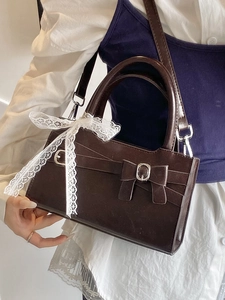 Borsa a mano vintage francese marrone scuro con fiocco in pizzo e tracolla sottile